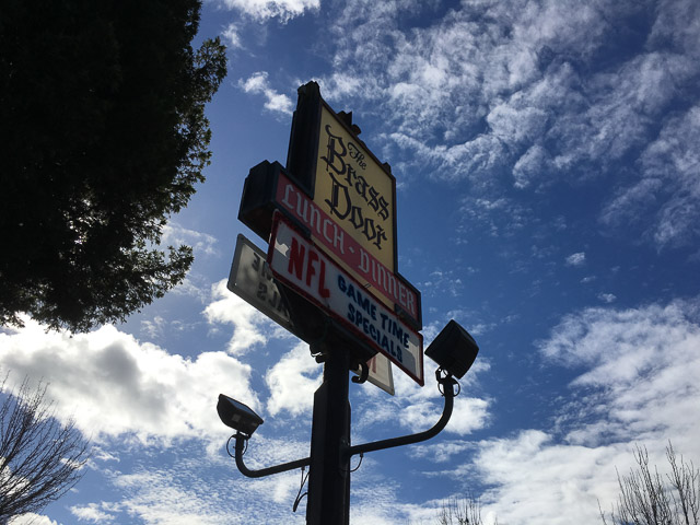 brass-door-san-ramon-sign-outside